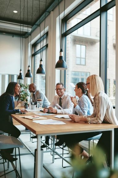 A group of people in the office meeting room