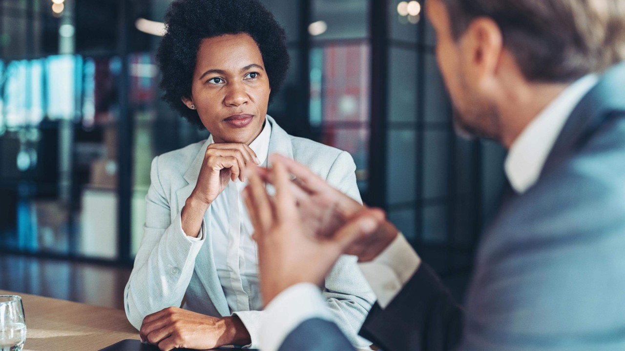 editorial-1455167762-people-sat-at-desk-2880x1620