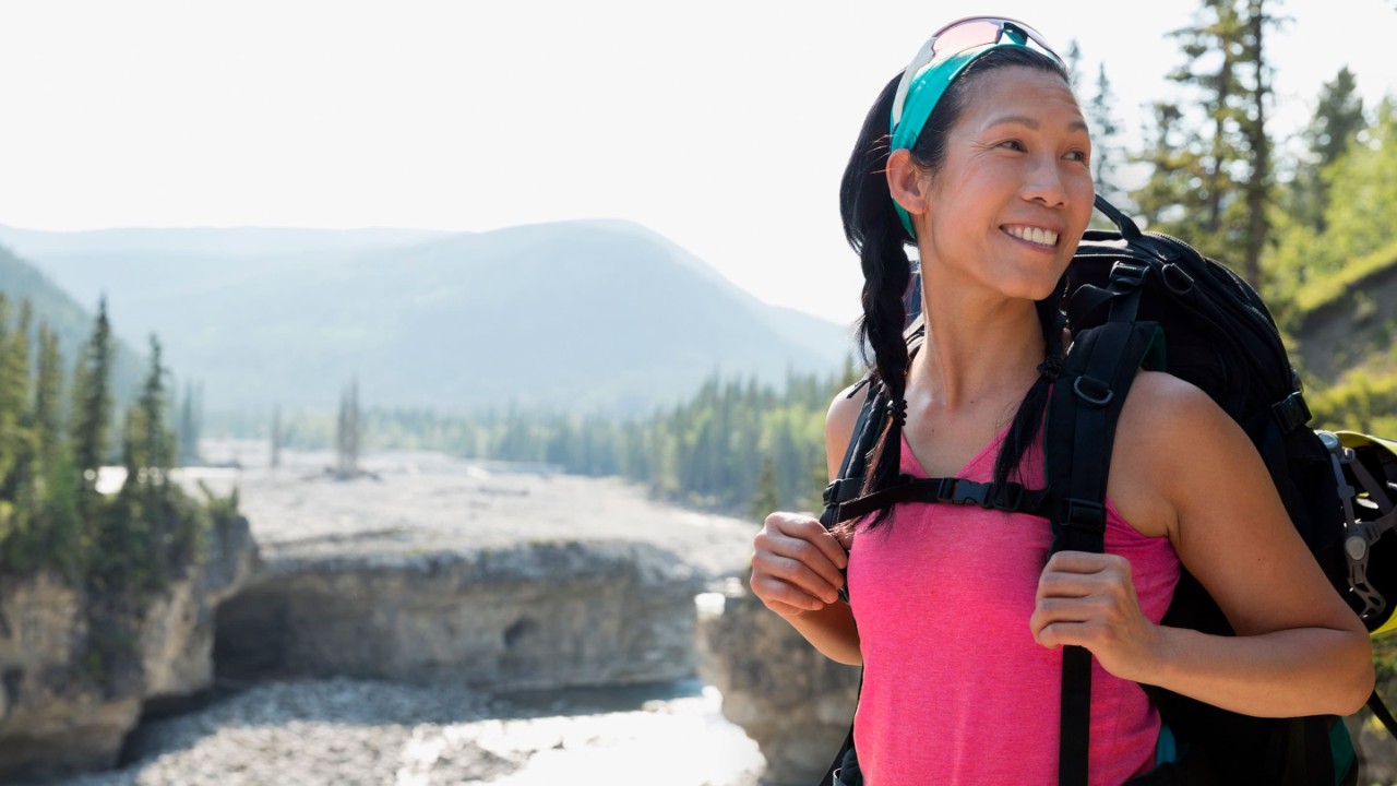woman hiking smiling